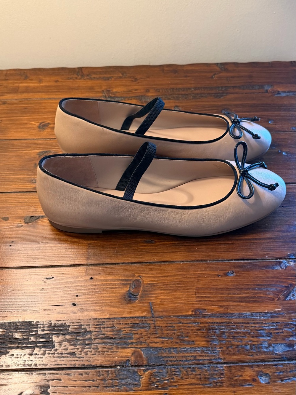 Stuart Weitzman Nude Beige Leather Ballet Flats with Black Trim